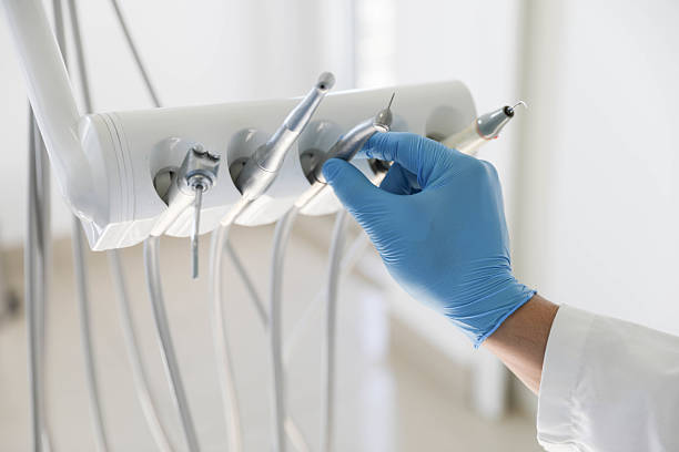 Professional Tooth Extraction technician working in Alton, IL